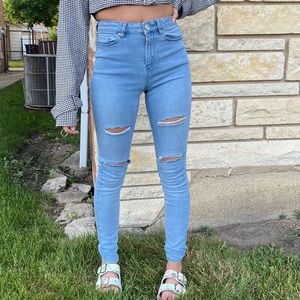 Slightly ripped blue jeans